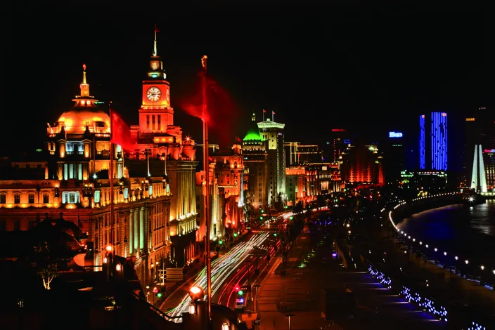 The historic waterfront buildings of the Bund lit at night
