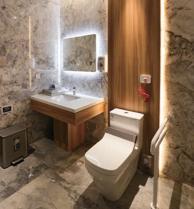 En-suite bathroom in a single patient ward at Shanghai SinoUnited Hospital